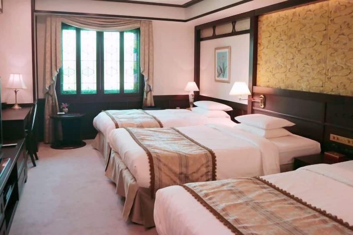 Premium bedding, down duvets, in-room safe, desk