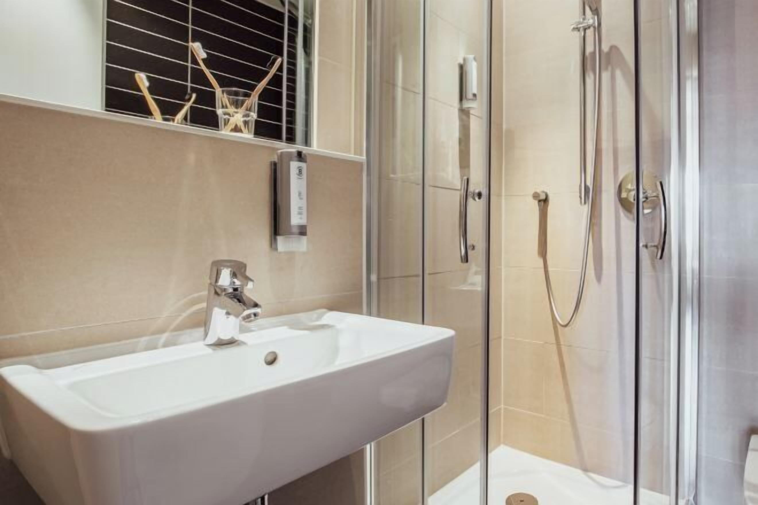 Bathroom | Shower, free toiletries, hair dryer, towels