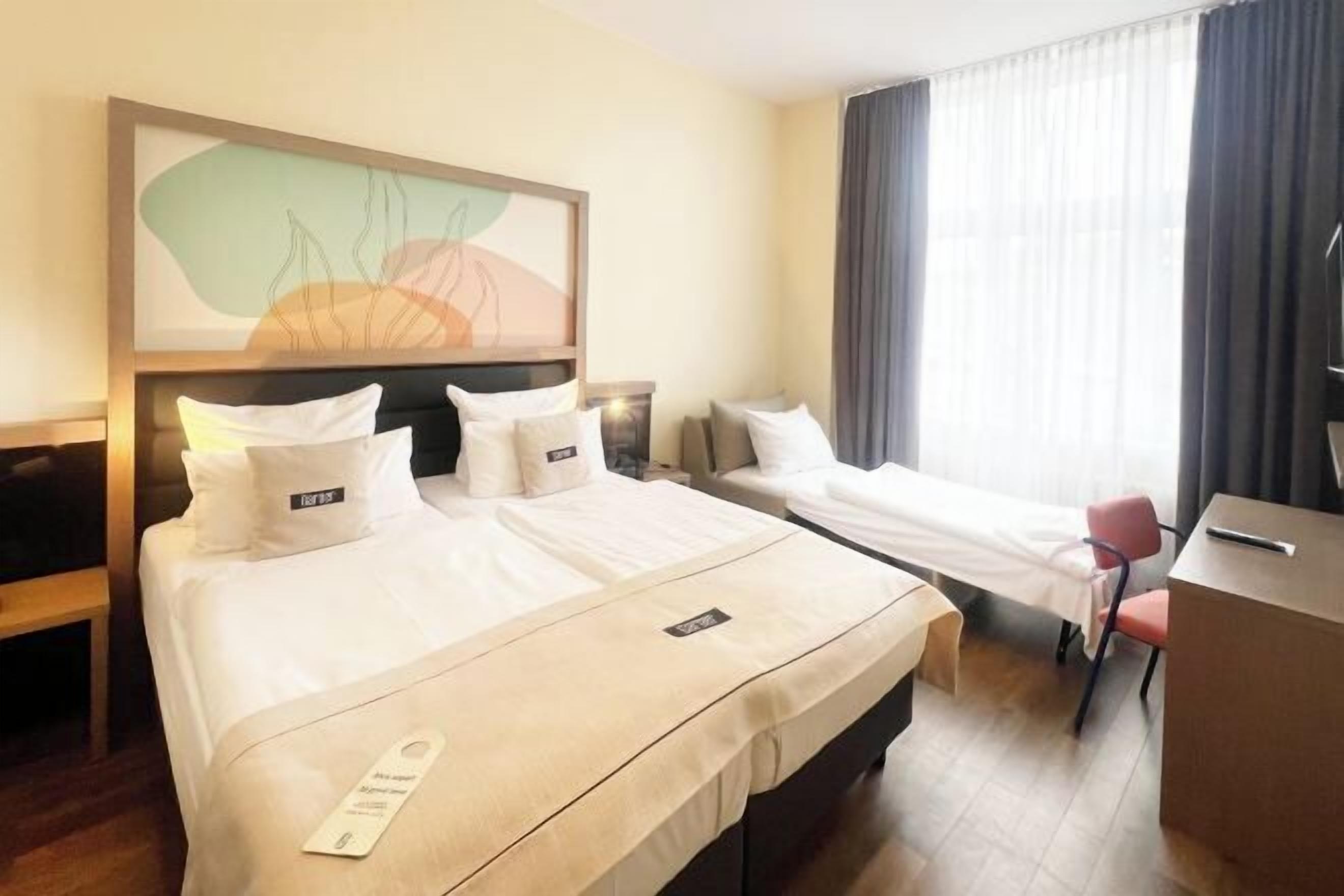 Premium bedding, pillow-top beds, in-room safe, desk