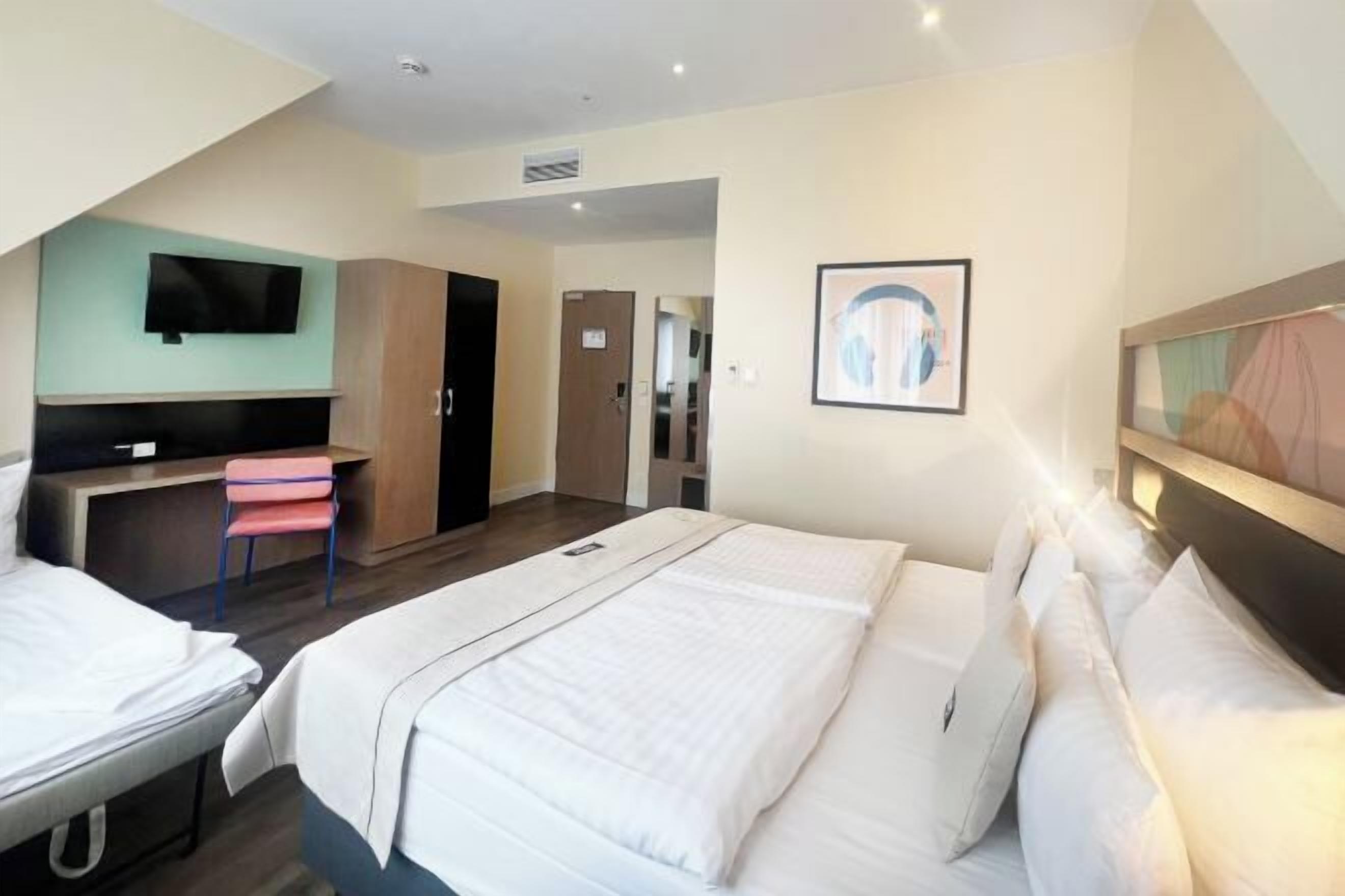 Premium bedding, pillow-top beds, in-room safe, desk