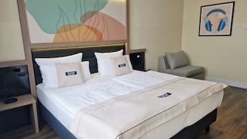 Premium bedding, pillow-top beds, in-room safe, desk