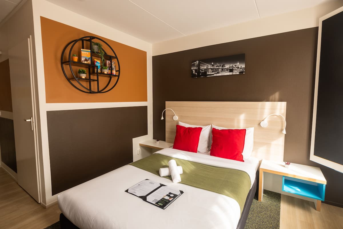 1 bedroom, desk, laptop workspace, blackout curtains