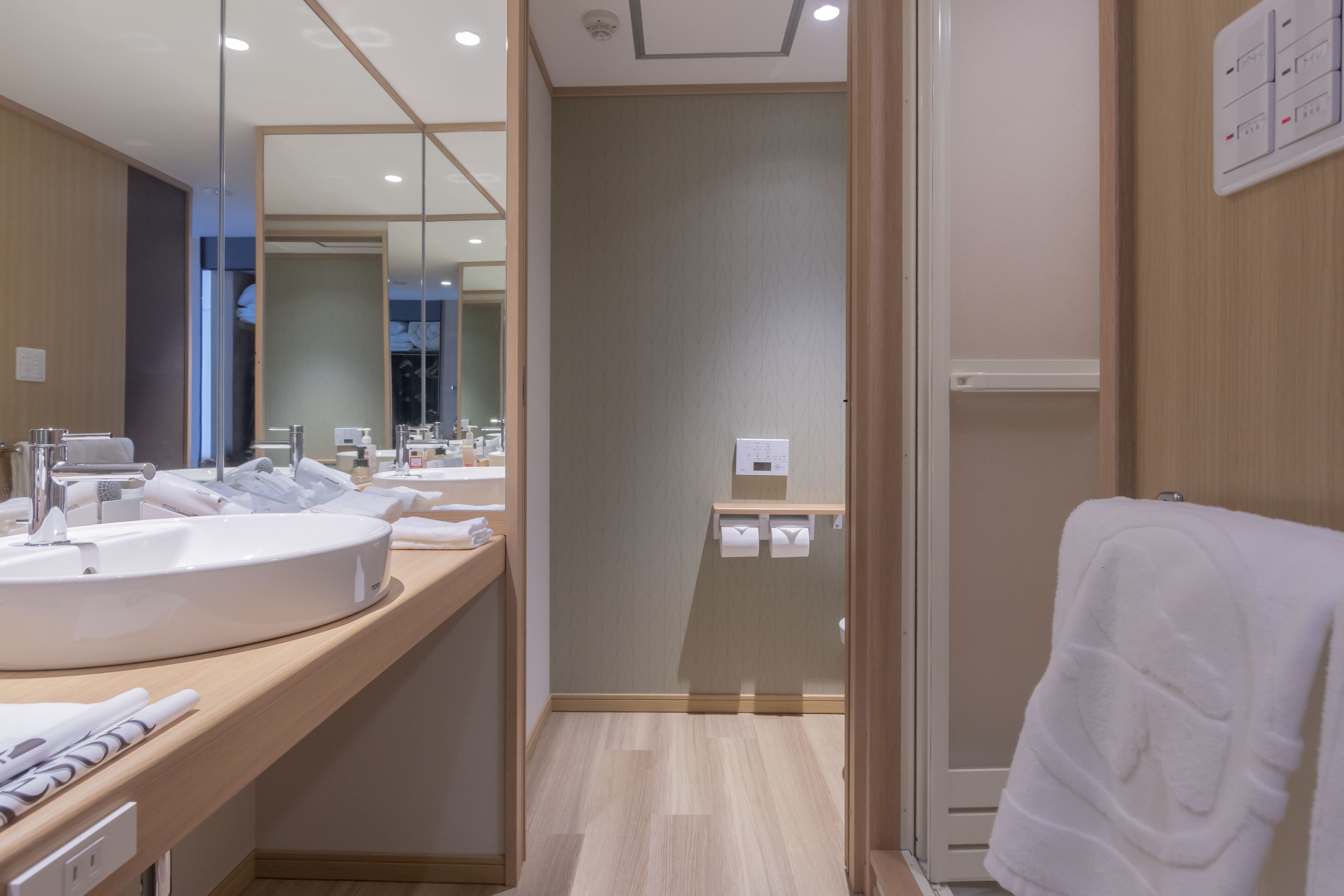 free toiletries, hair dryer, slippers, electronic bidet