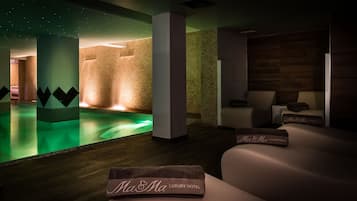 Indoor pool, seasonal outdoor pool, pool umbrellas, pool loungers