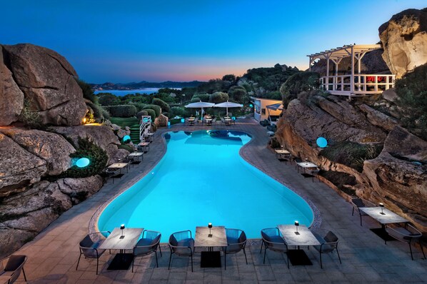 Indoor pool, seasonal outdoor pool, pool umbrellas, pool loungers