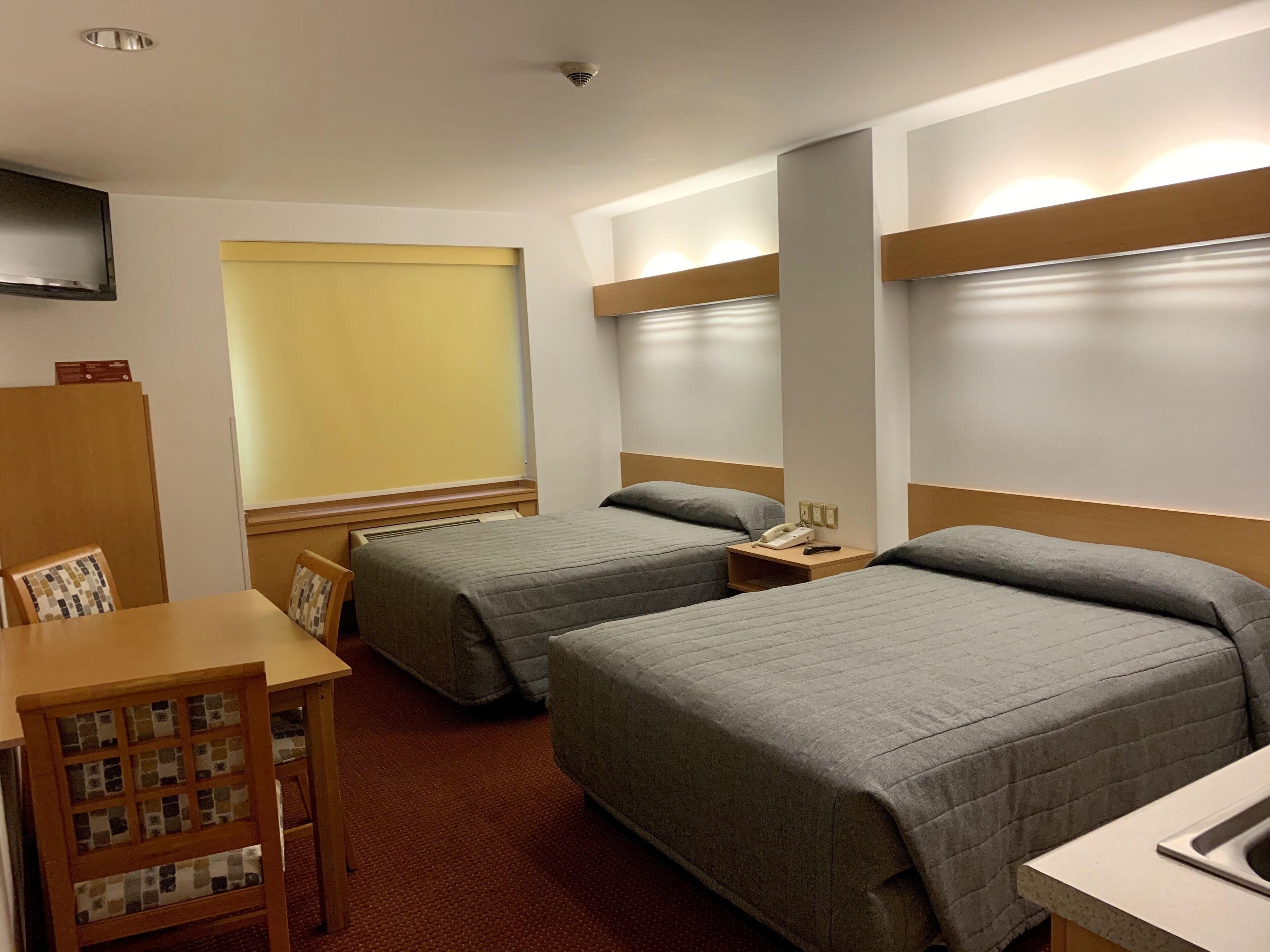junior suite, 2 queen beds | in-room safe, desk, soundproofing, iron/ironing board
