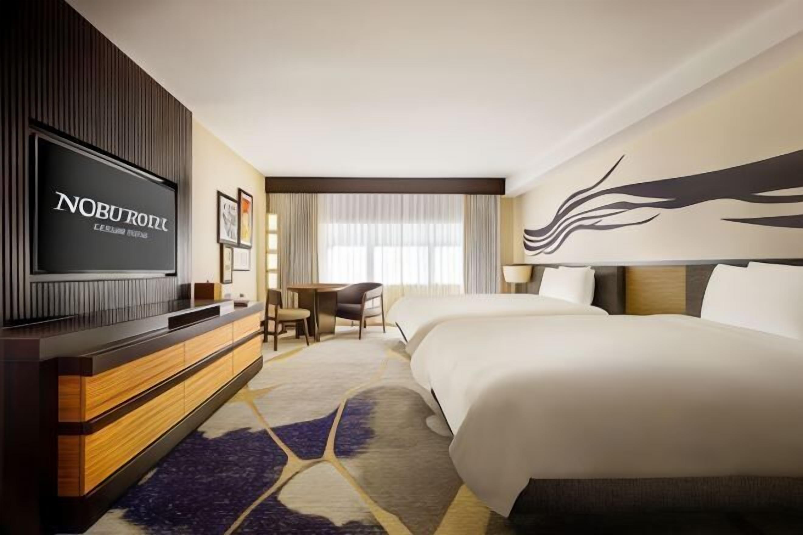 Ropa de cama de alta calidad, colchones con pillow-top y minibar 