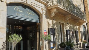 A building with a sign for 'Olivier Leflaive Hotel Restaurants.' - Olivier leflaive (Puligny-Montrachet)
