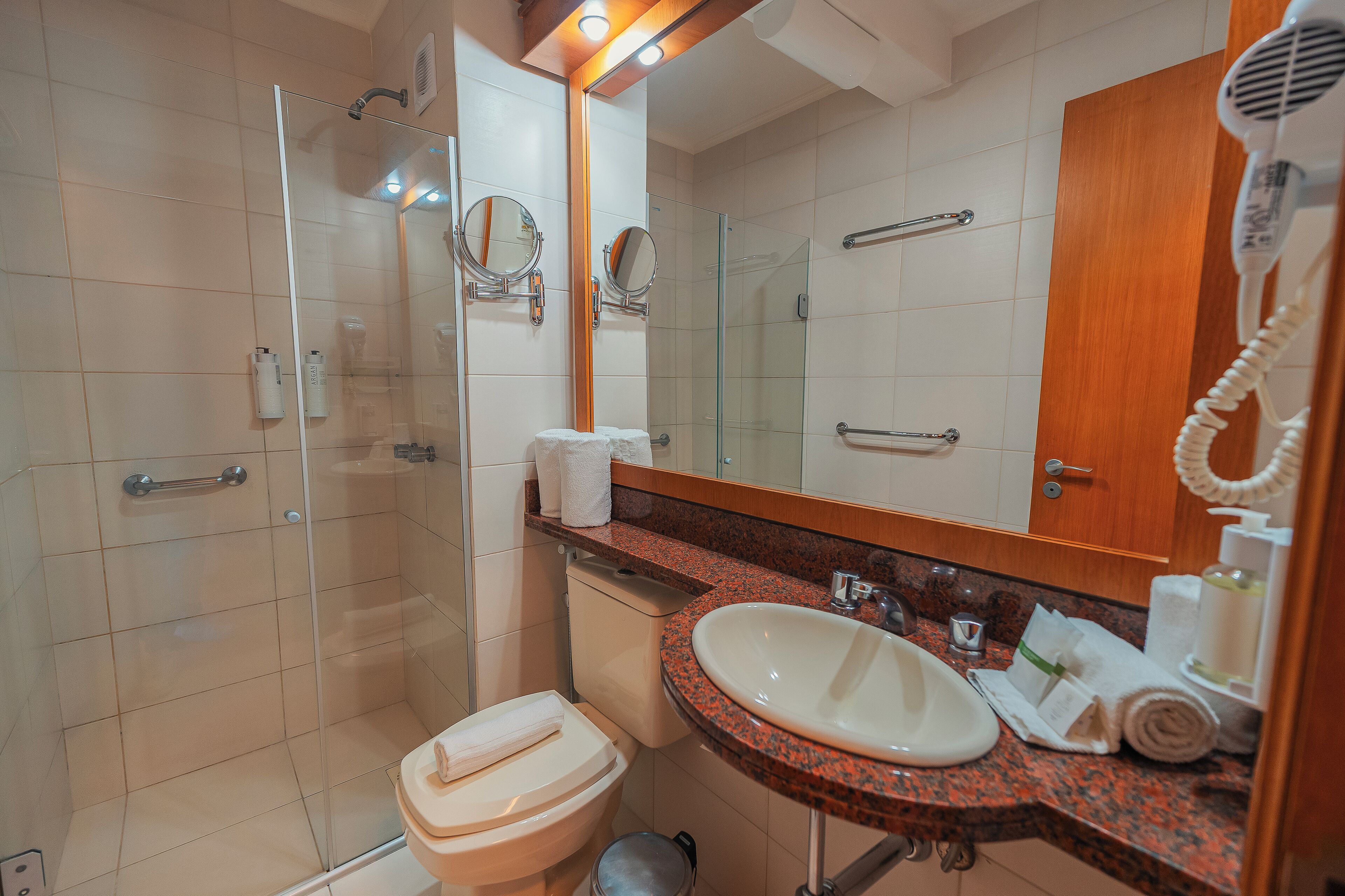 deluxe double or twin room | bathroom | shower, hair dryer, towels, soap