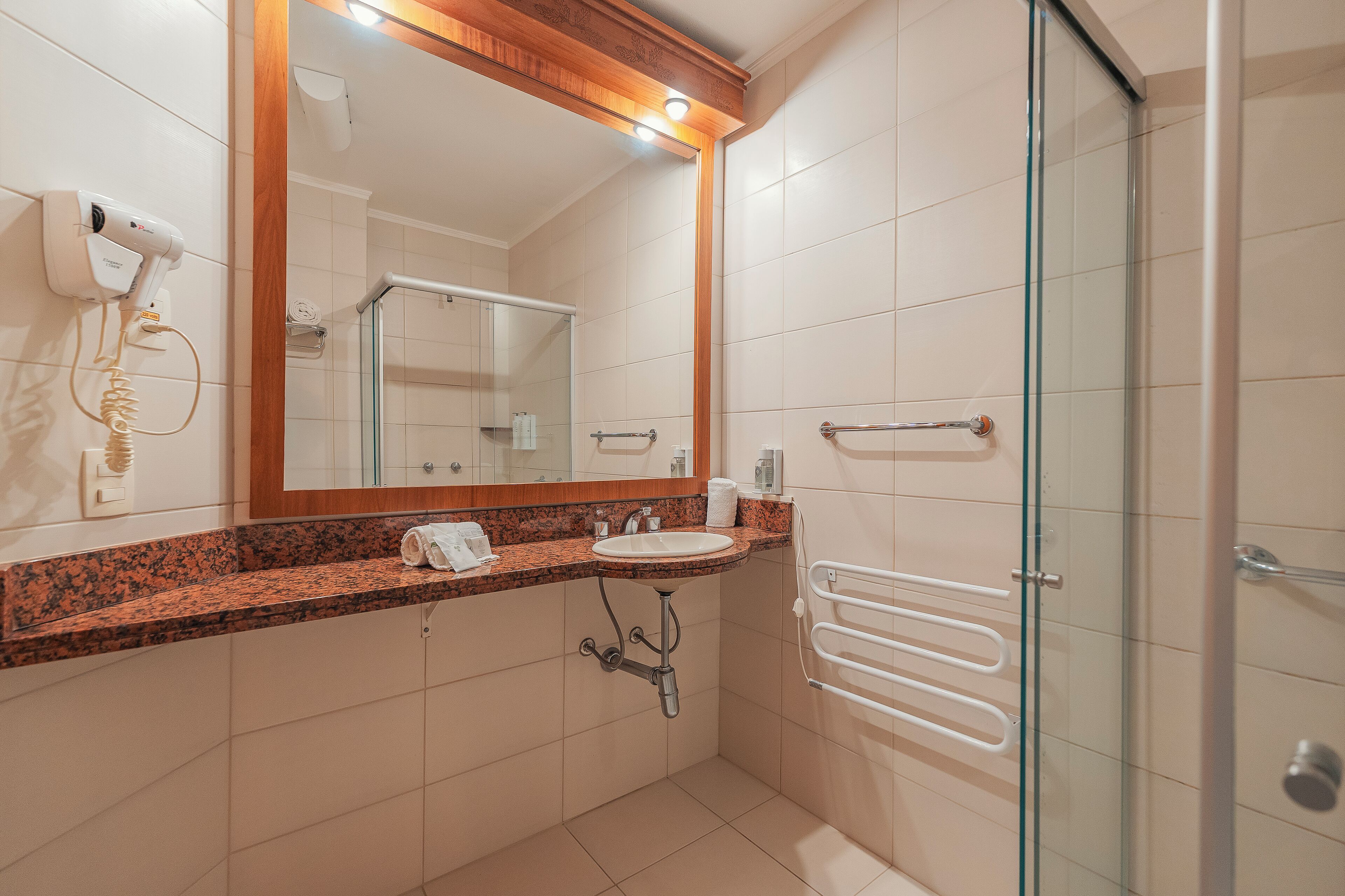 luxury apartment | bathroom | shower, hair dryer, towels, soap