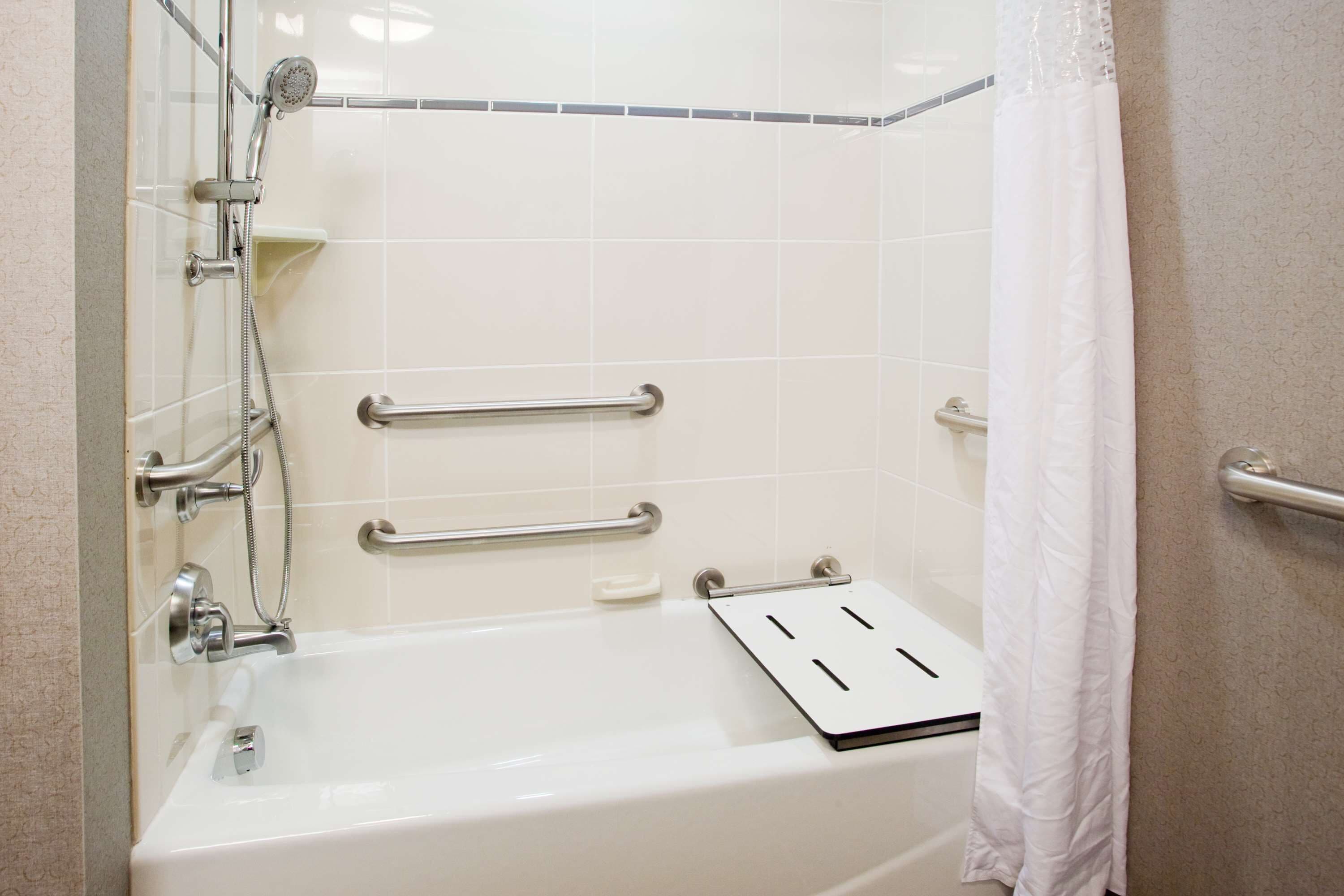 king hear accessible w tub | bathroom | designer toiletries, hair dryer, towels