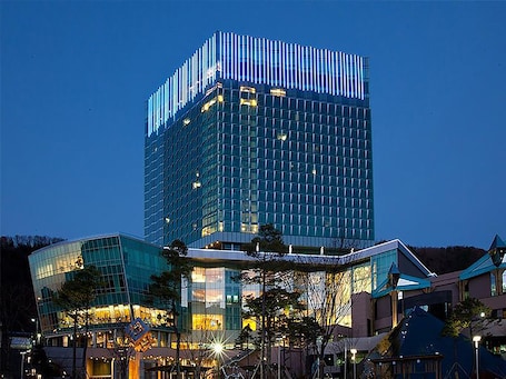 Front of property – evening/night. High1 Grand Hotel Convention Tower