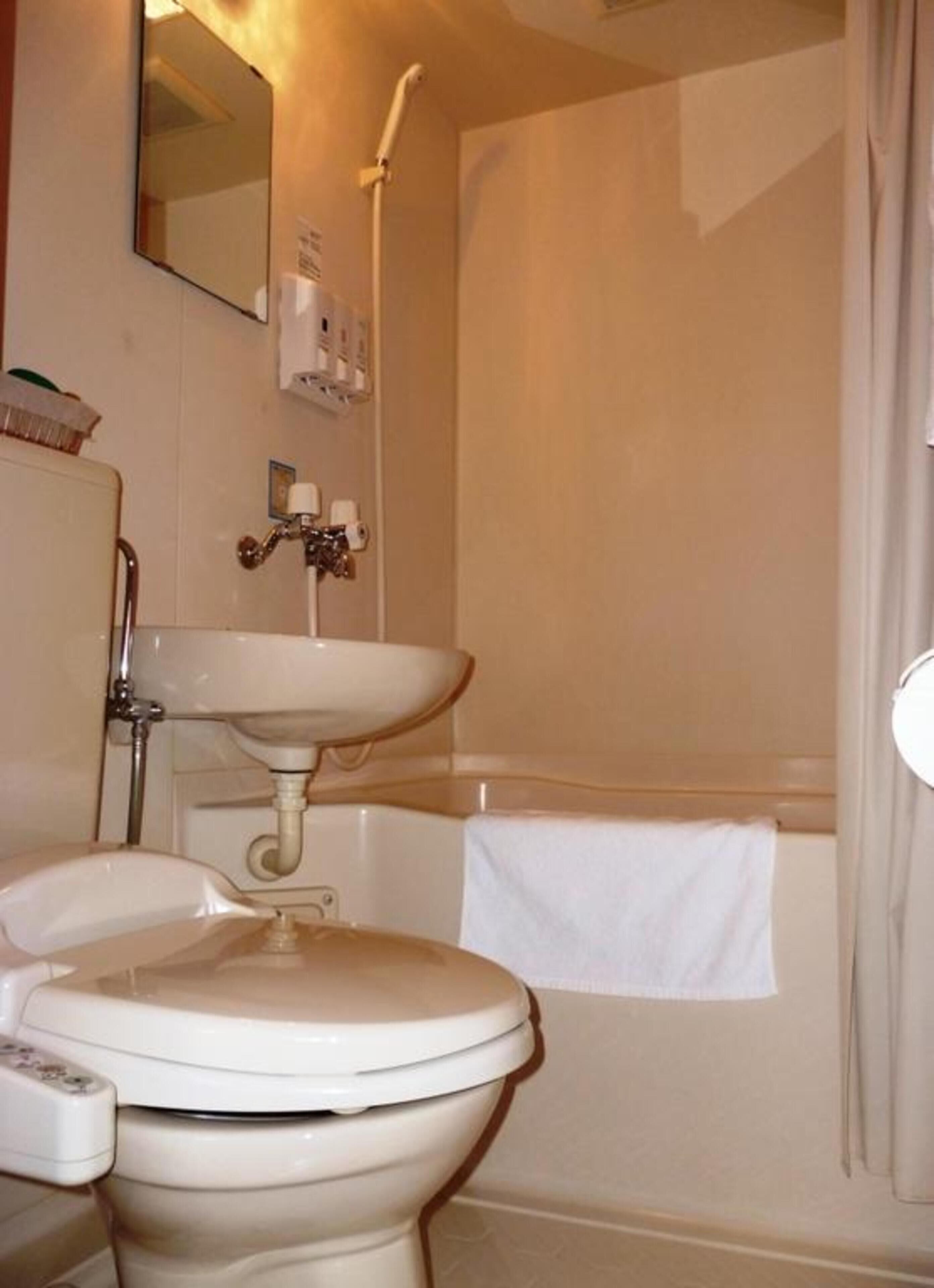 slippers, electronic bidet, towels