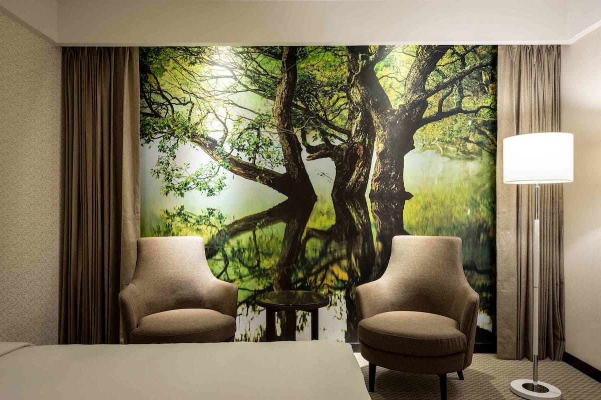 superior quadruple room, 2 queen beds, no windows | minibar, in-room safe, desk, blackout curtains