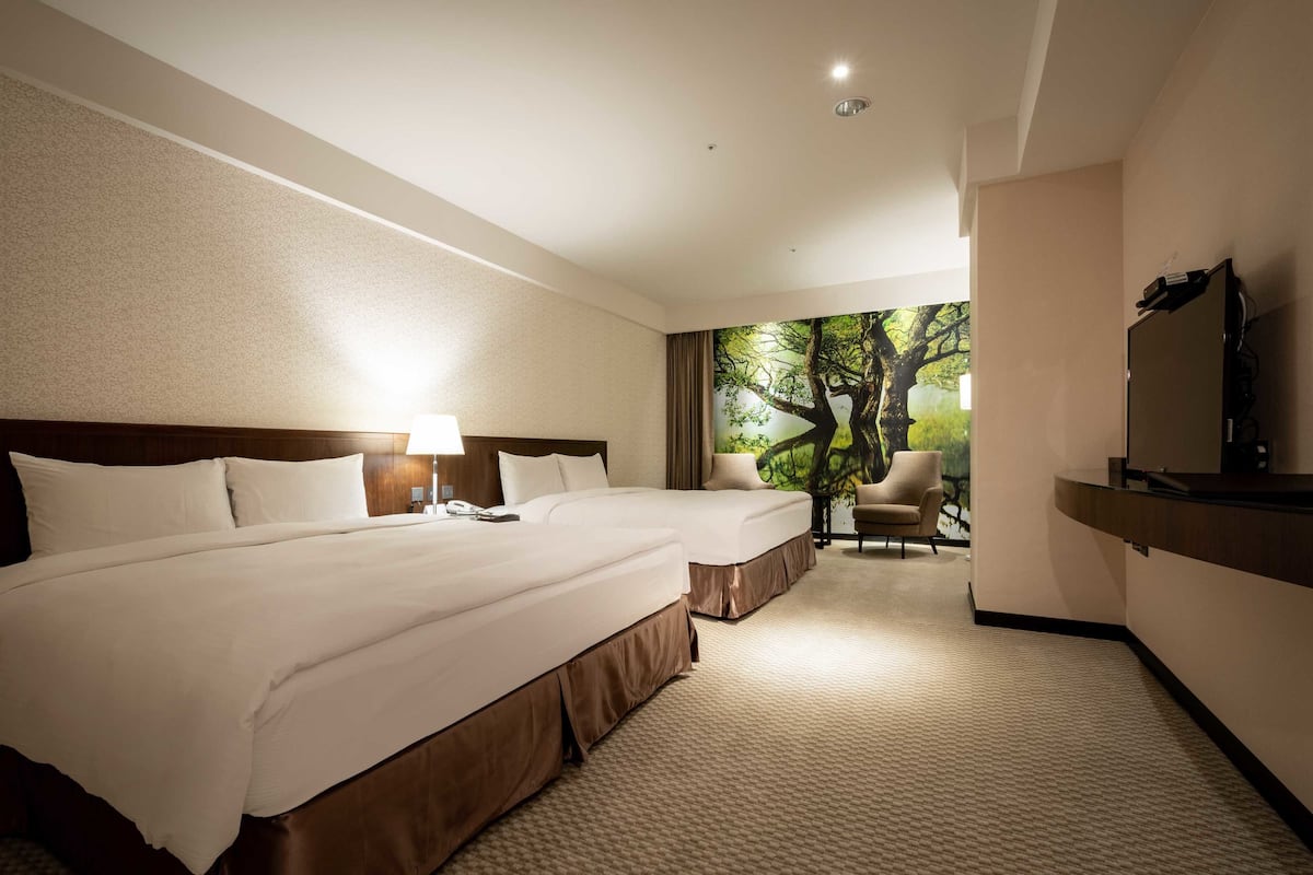 superior quadruple room, 2 queen beds, no windows | minibar, in-room safe, desk, blackout curtains