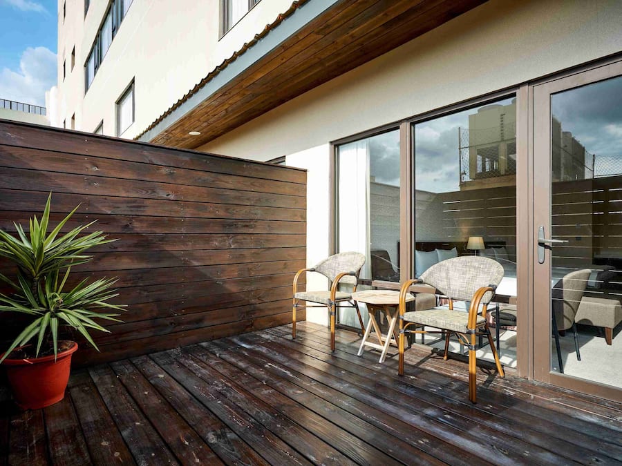 Deluxe Quadruple Room, 2 Queen Beds, Bathtub-Parking Available | Terrace/patio