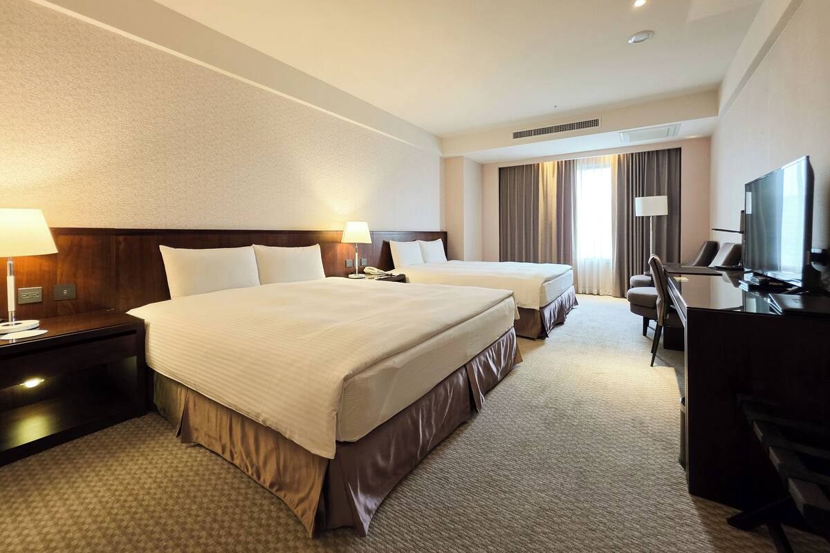 Comfort Quadruple Room without parking | Minibar, in-room safe, desk, blackout curtains
