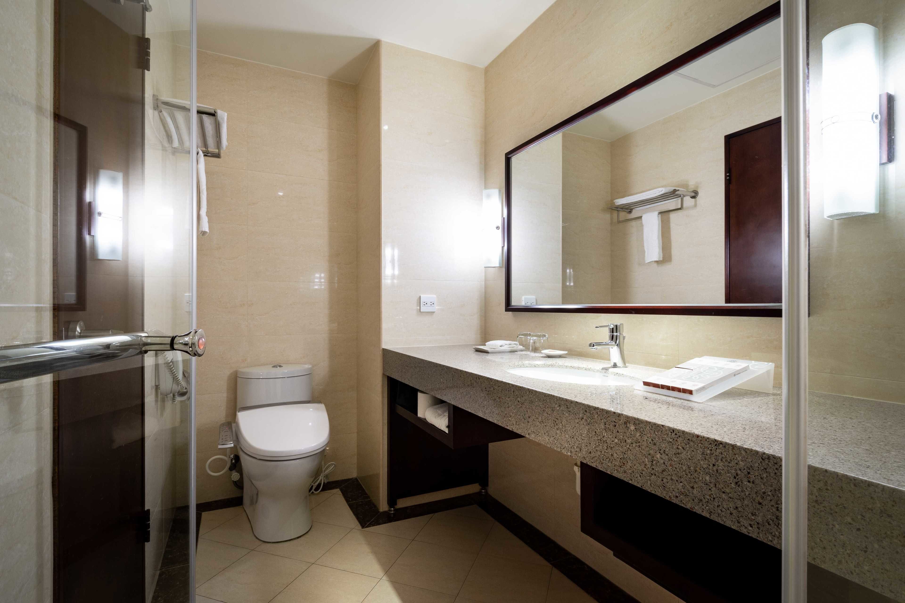 no parking-superior room-interior-double | bathroom | hair dryer, slippers, bidet, towels