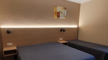 Escritorio, sistema de insonorización y camas plegables/adicionales