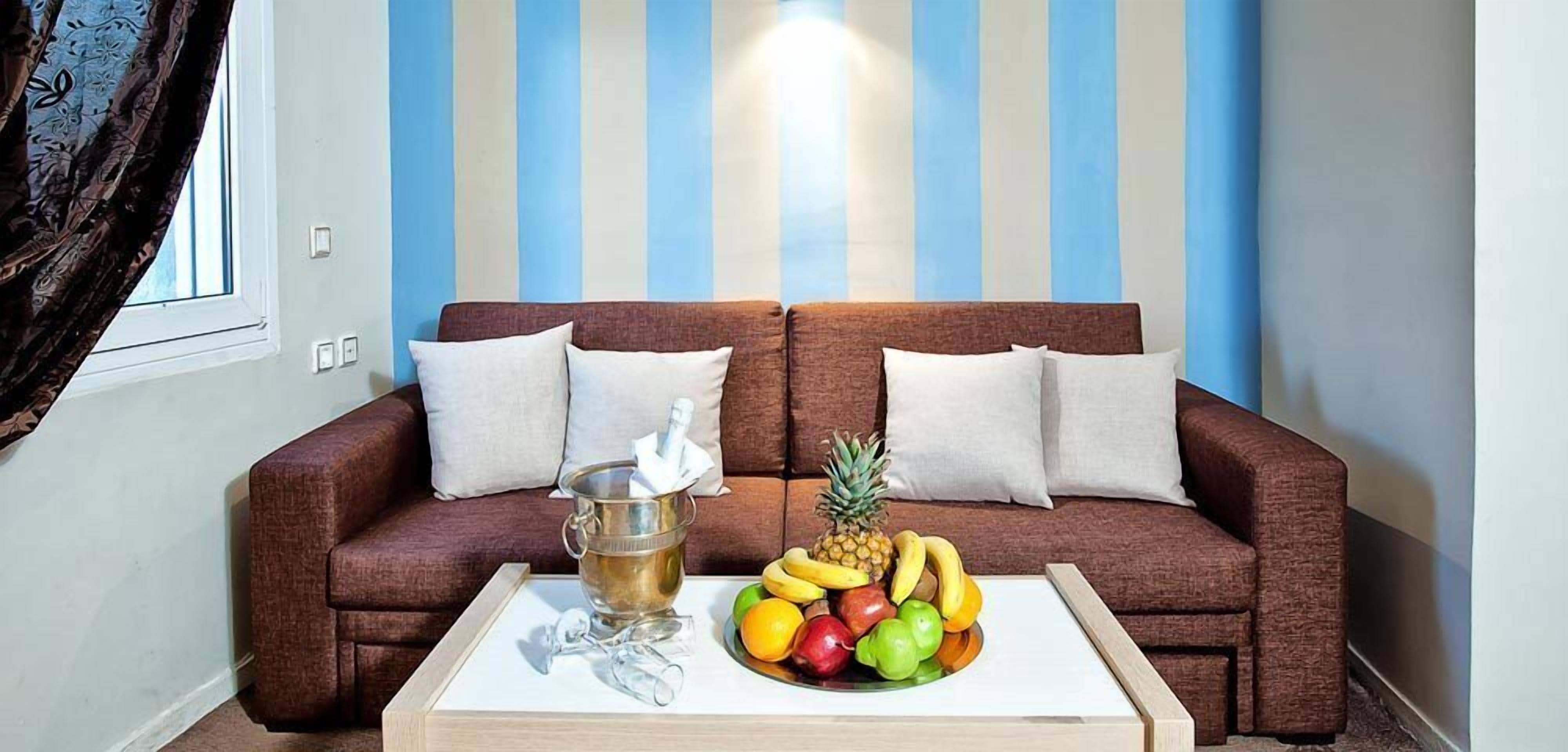 Superior Double Room, Lake View | Living room | TV