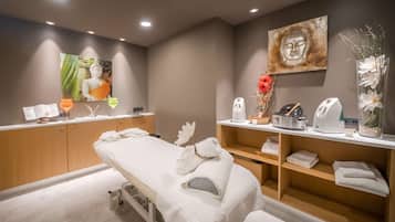 Massages aux pierres chaudes, massages sportifs, 1 salle de soins