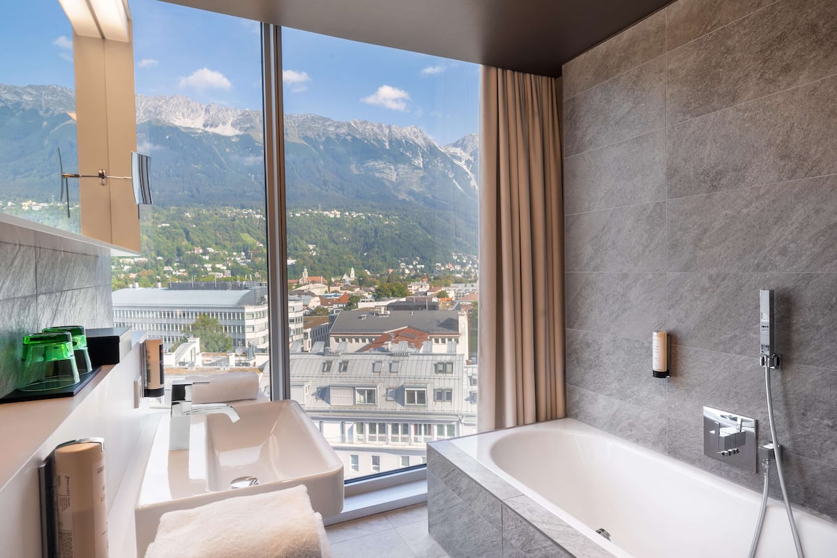 deluxe room | bathroom | free toiletries, hair dryer, slippers, towels