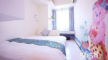 Family Quadruple Room, 2 Bedrooms | Desk, blackout curtains, free WiFi, bed sheets