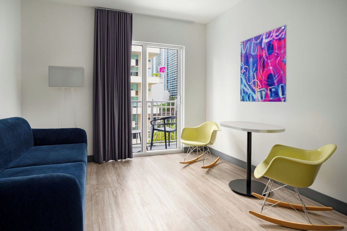 Studio, 1 King Bed with Sofa bed, Balcony (High Floor) | Living area | 42-inch LED TV with premium TV channels, TV