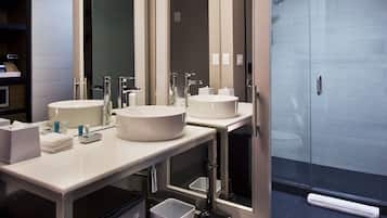 Separate tub and shower, rainfall showerhead, designer toiletries