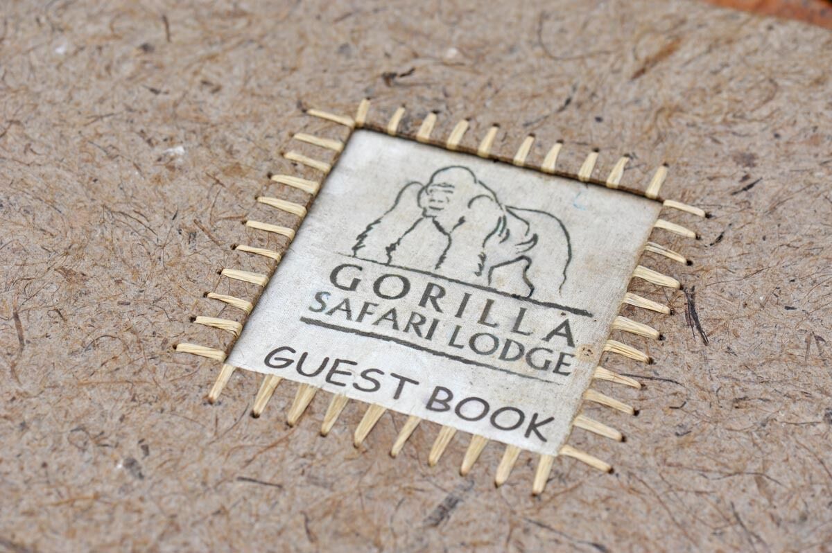 A guest book with a gorilla illustration and the text "GORILLA SAFARI LODGE GUEST BOOK".
