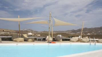 Outdoor pool, pool umbrellas, pool loungers