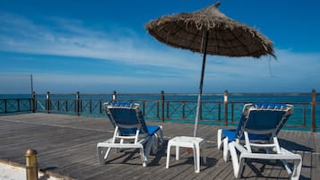 Private beach, sun-loungers, beach umbrellas, beach towels