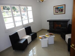 32-inch flat-screen TV with cable channels, TV