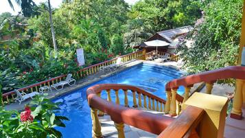 Outdoor pool, pool umbrellas, sun loungers