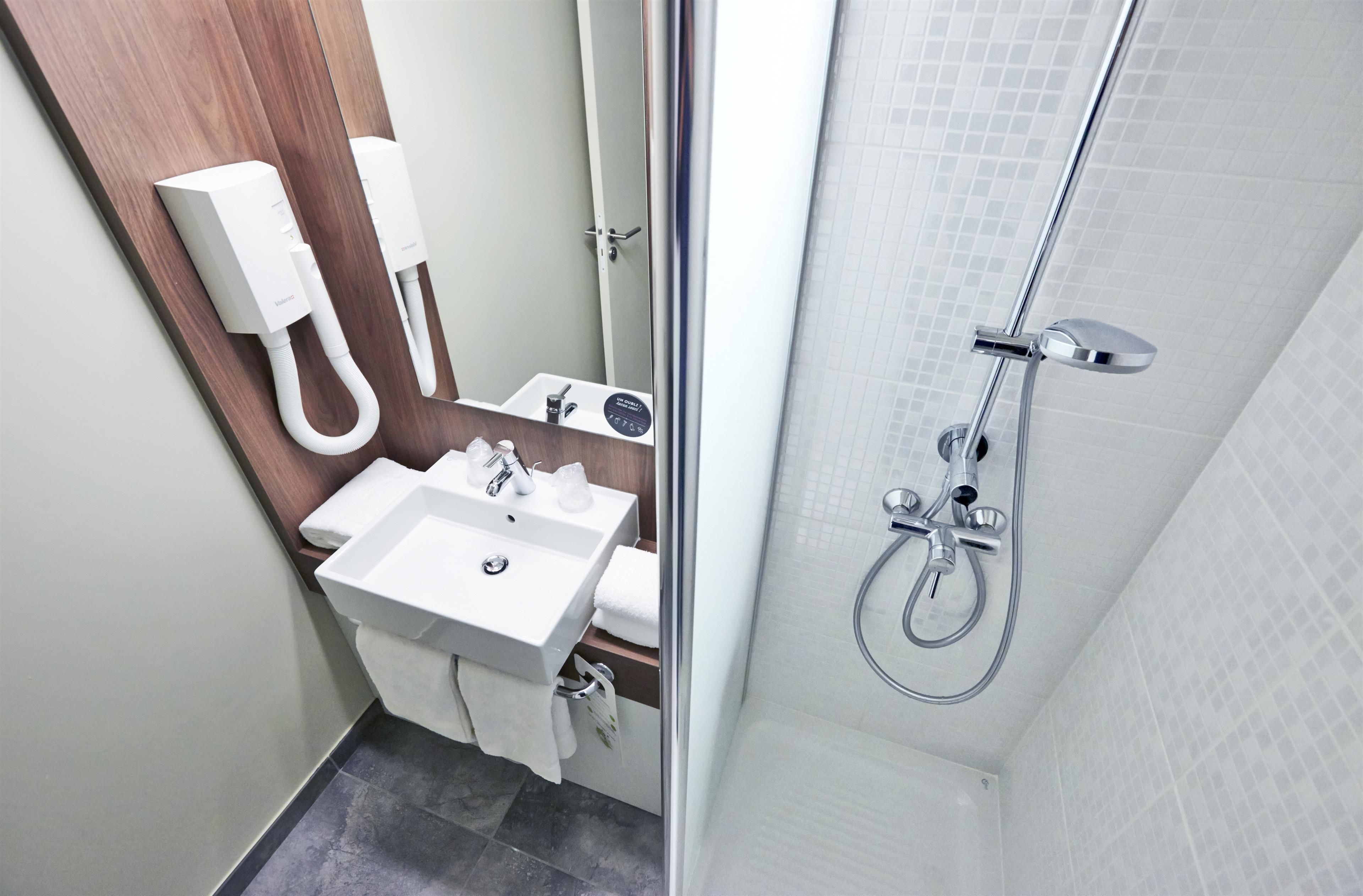 shower, eco-friendly toiletries, hair dryer, towels