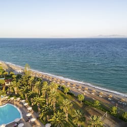On the beach, sun-loungers, beach umbrellas, beach towels