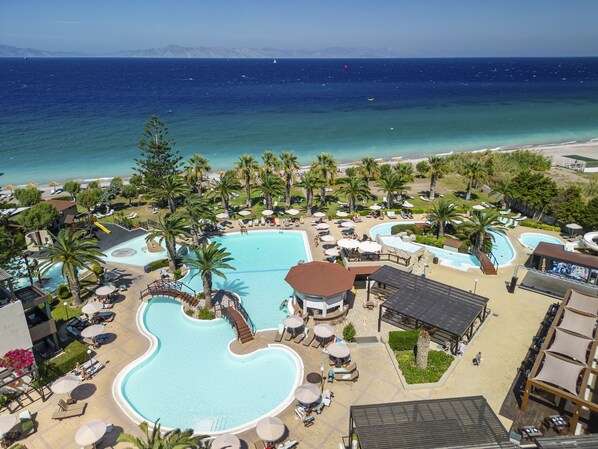 Indoor pool, outdoor pool, pool umbrellas, pool loungers