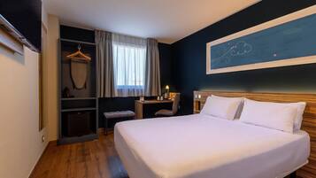 Premium bedding, pillow-top beds, desk, blackout curtains