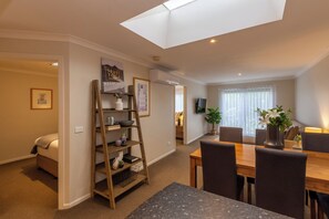 Standard Two Bedroom Apartment | Living area | 106-cm flat-screen TV with digital channels, TV, DVD player