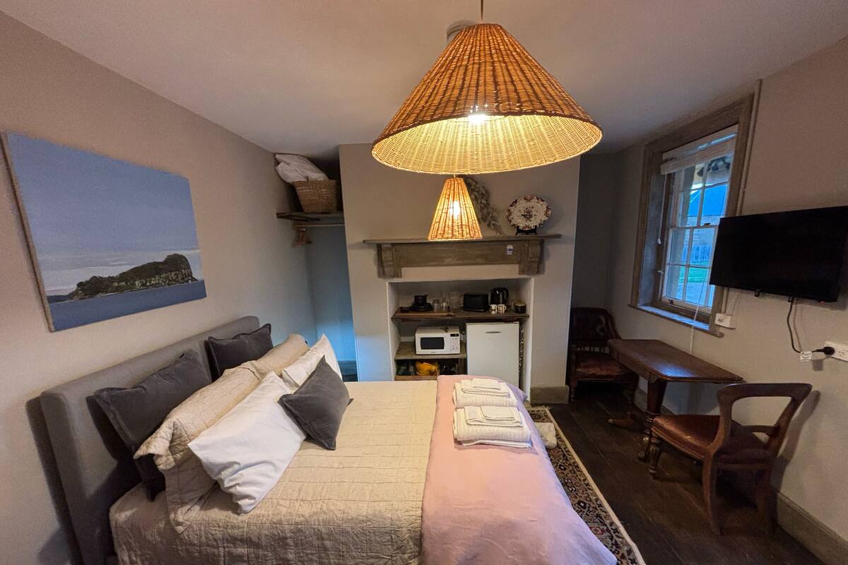 Premium bedding, blackout drapes, WiFi (free), individually decorated