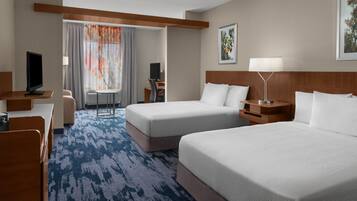 Premium bedding, desk, laptop workspace, iron/ironing board