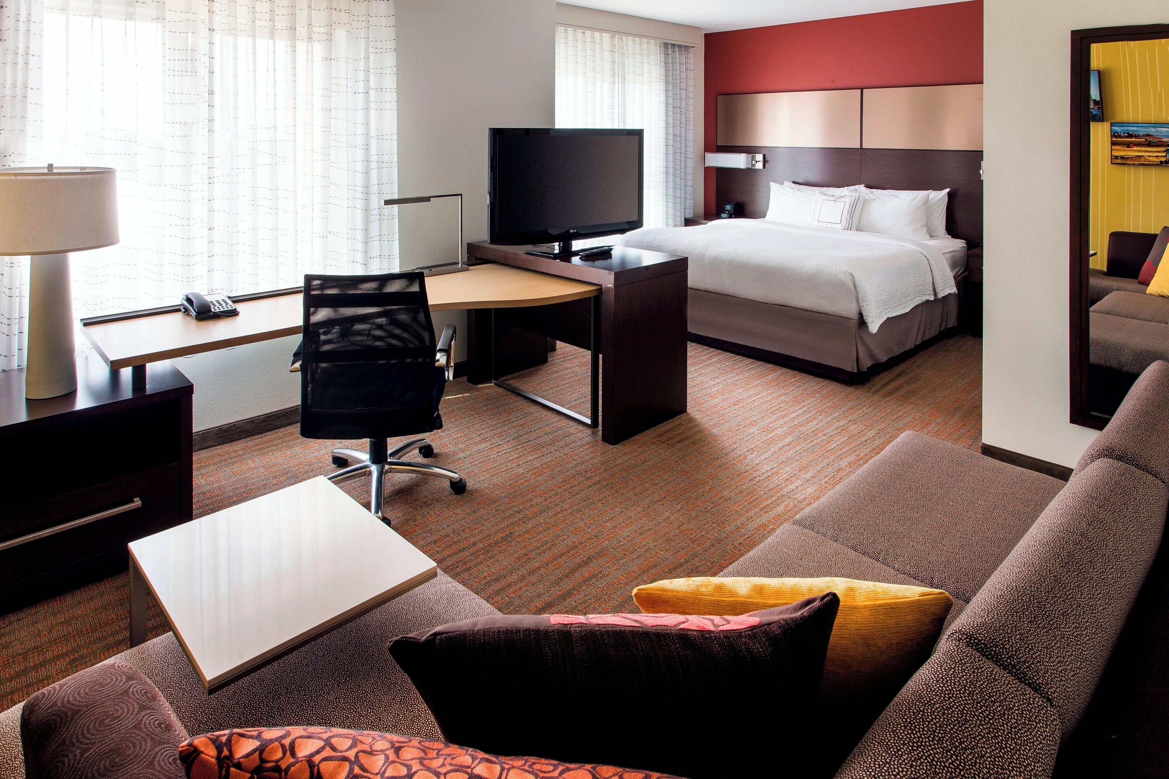 premium bedding, down duvets, desk, laptop workspace