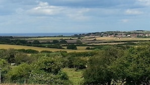 A rural landscape with fields, trees, and a distant village. - The Ellerby Country Inn (Saltburn-by-the-Sea)