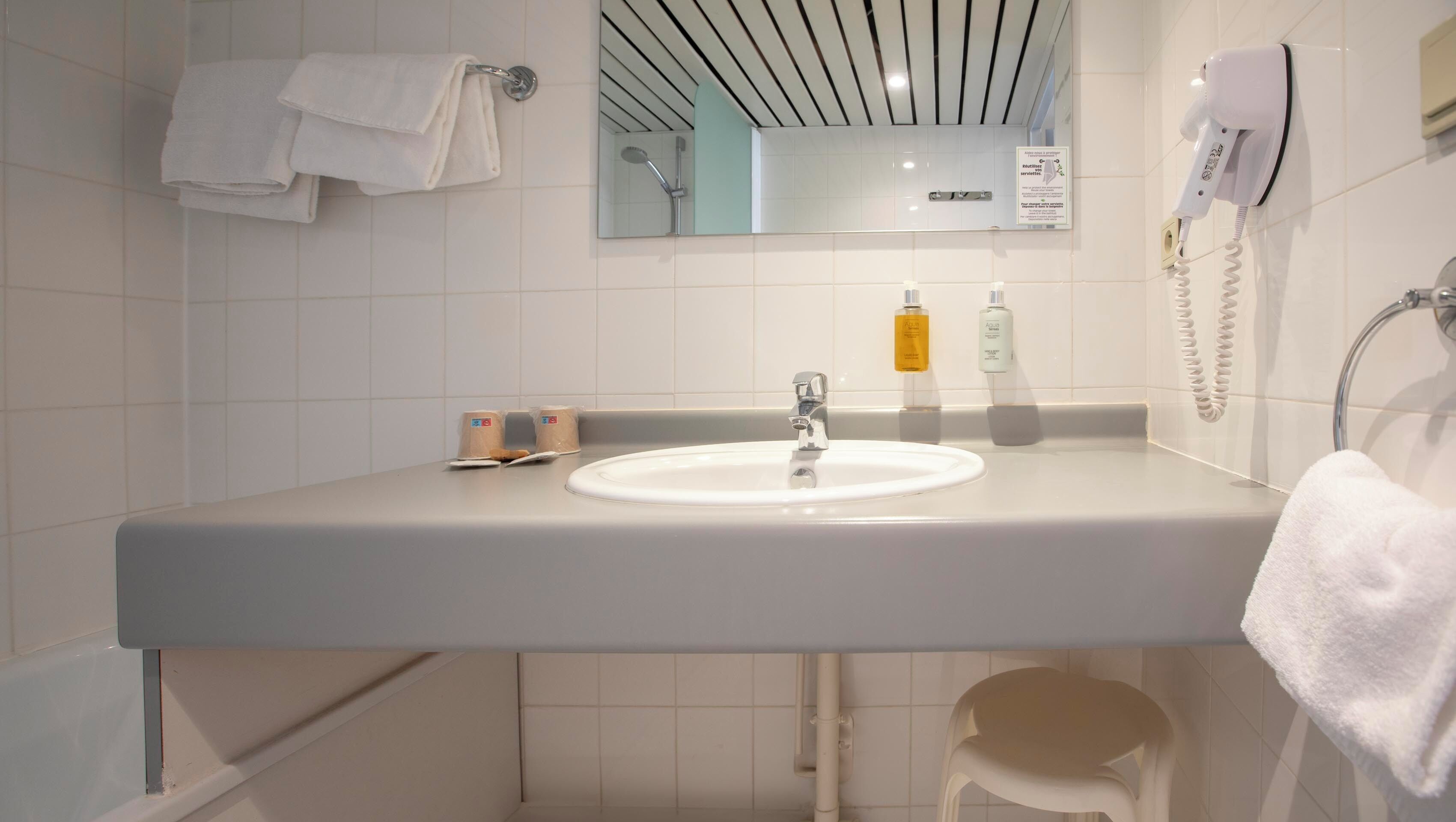 superior double room | bathroom | hair dryer, bidet, towels, soap