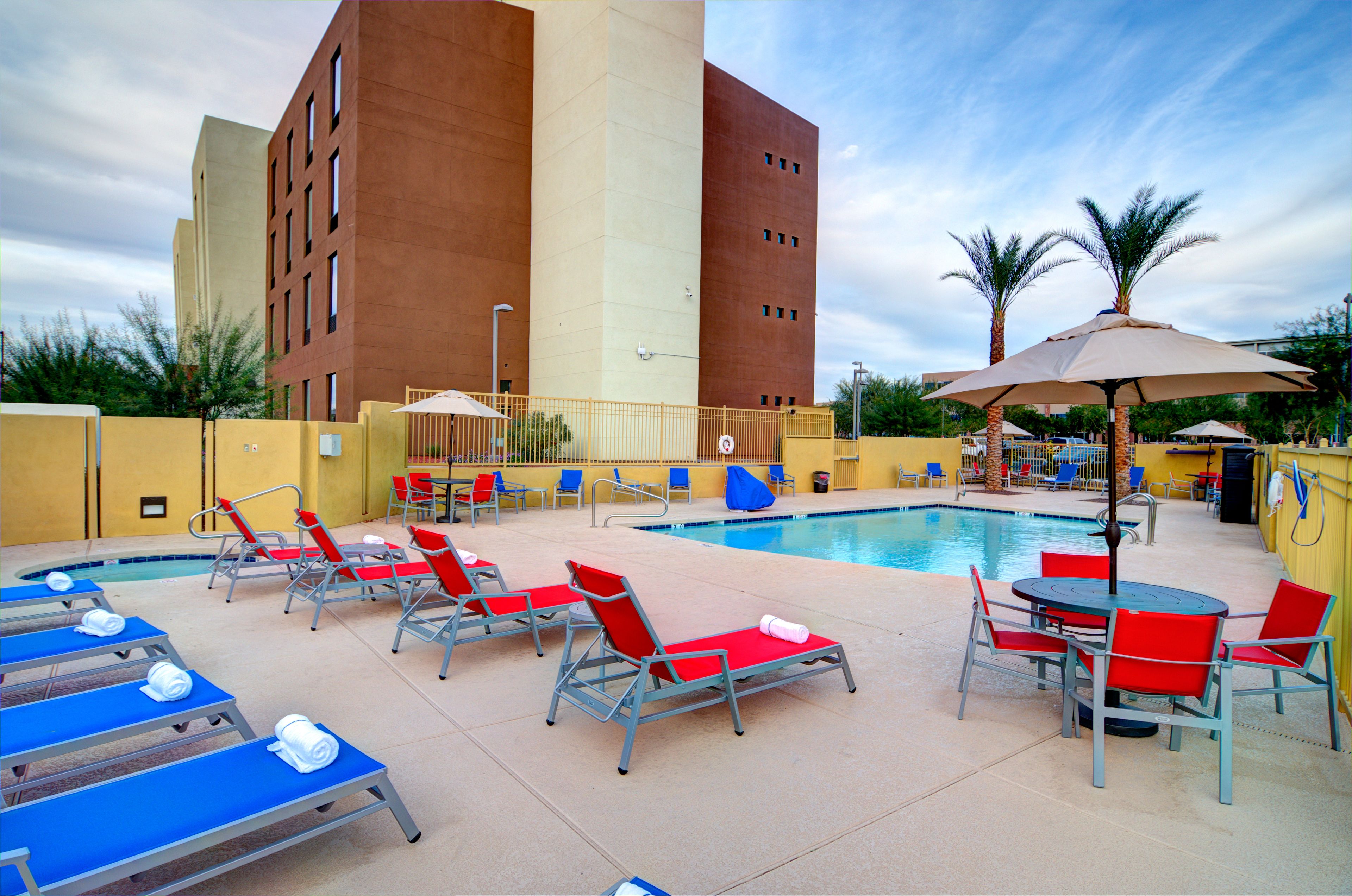 Outdoor pool, open 8:00 AM to 8:00 PM, pool umbrellas, sun loungers