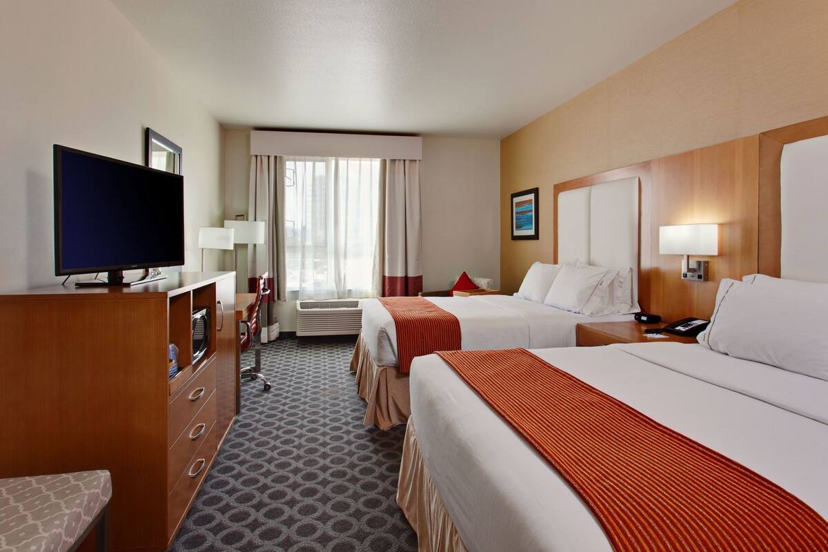 Hypo-allergenic bedding available, in-room safe, desk, laptop workspace