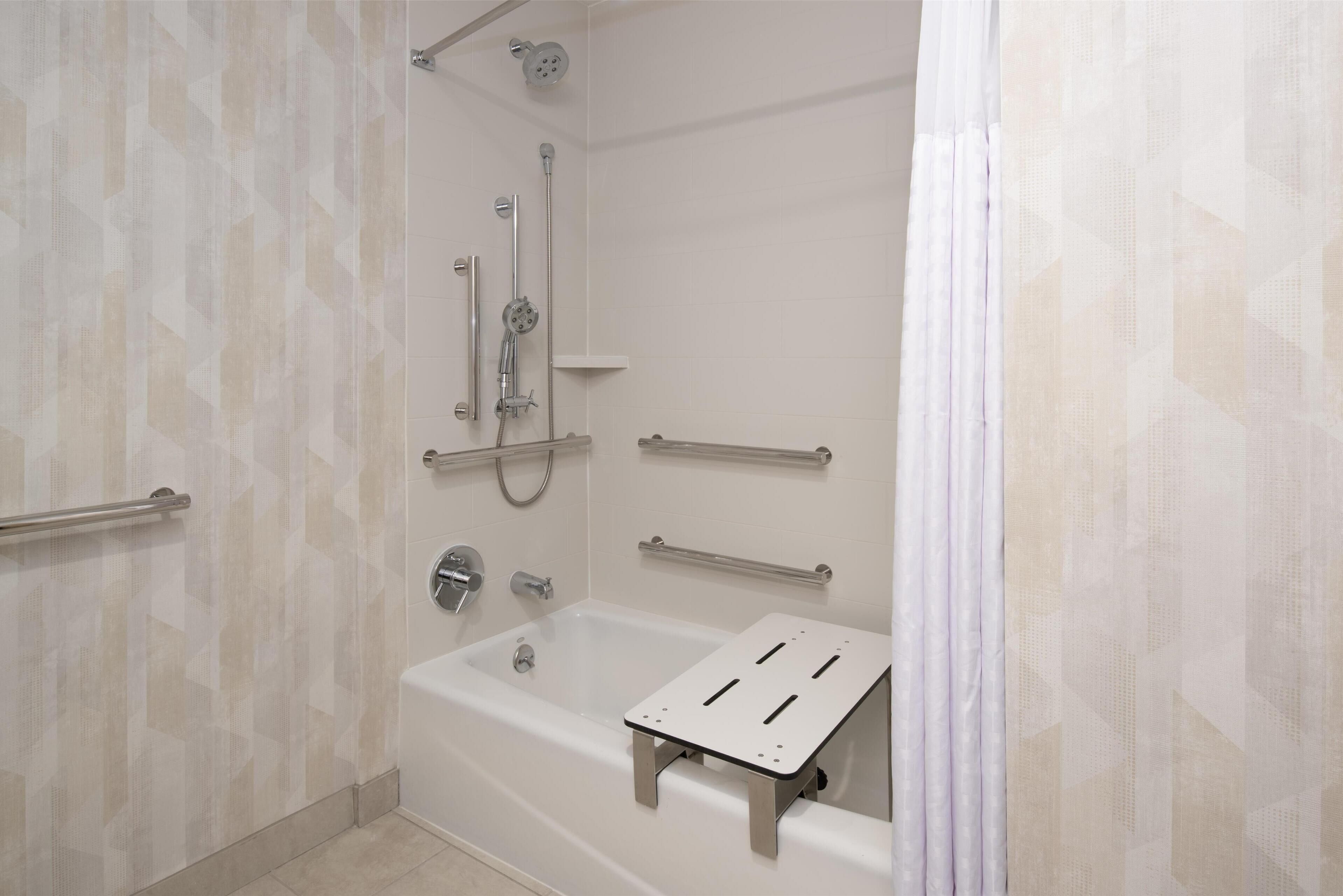 combined shower/bathtub, free toiletries, hair dryer, towels