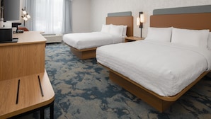 A hotel room with two beds, a desk, a chair, a TV, and a window with curtains. - Hampton Inn by Hilton North Hollywood (North Hollywood)