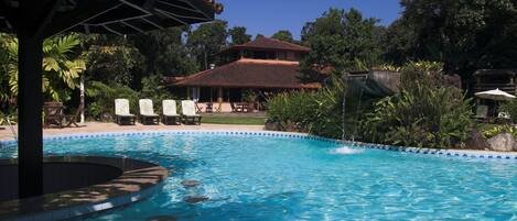 Outdoor pool, pool umbrellas, sun loungers