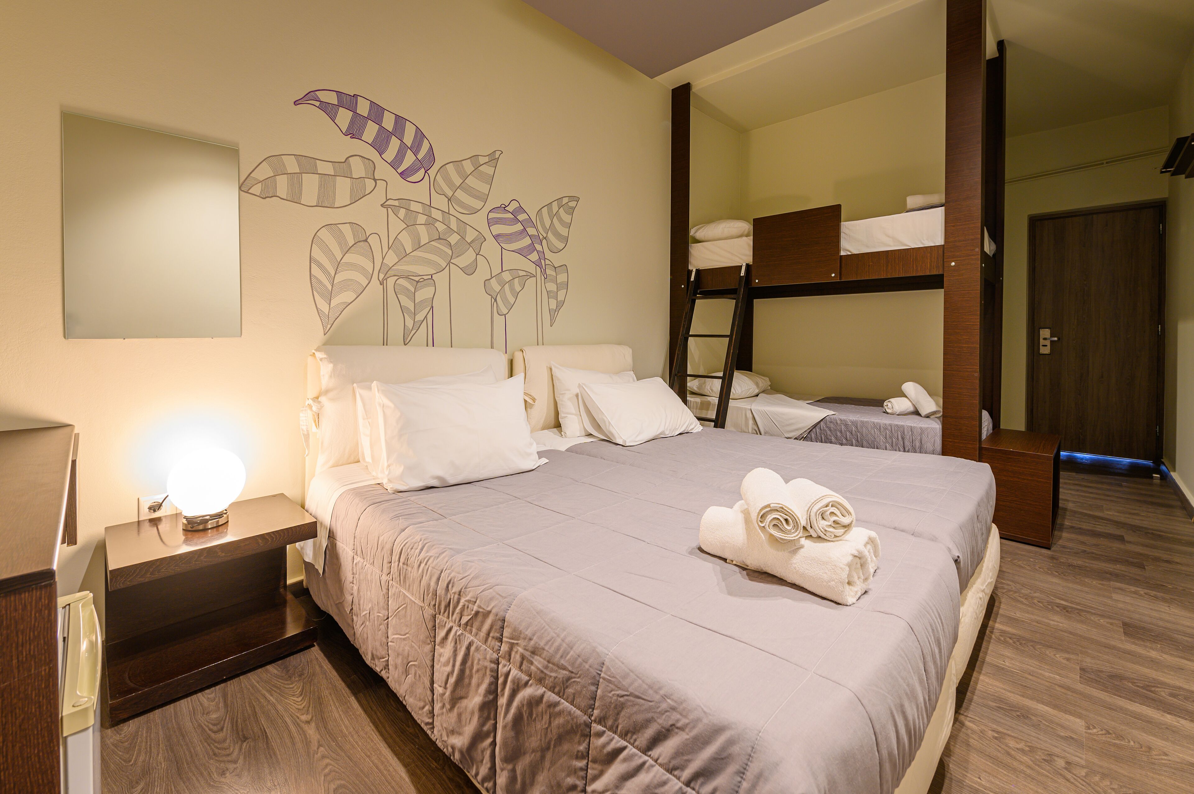 standard quadruple room, 1 bedroom | 1 bedroom, minibar, in-room safe, individually decorated